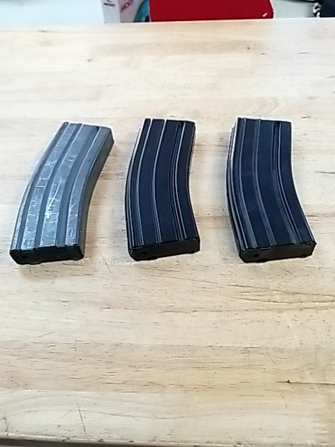 Item #10 — Three AR-15 Magazines, each 7 inch long photo 1 of 4