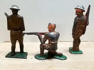 Item #76 — Three Vintage Metal Toy Soldiers 3 in photo 4 of 4