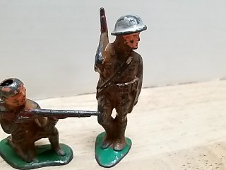 Item #76 — Three Vintage Metal Toy Soldiers 3 in photo 3 of 4