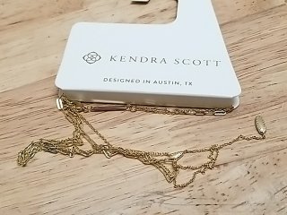 Item #16 — New Kendra Scott Gold Necklace