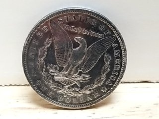 Item #28 — 1879 O Morgan Silver Dollar, cleaned photo 3 of 3