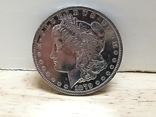 Item #28 — 1879 O Morgan Silver Dollar, cleaned