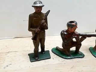 Item #76 — Three Vintage Metal Toy Soldiers 3 in photo 2 of 4