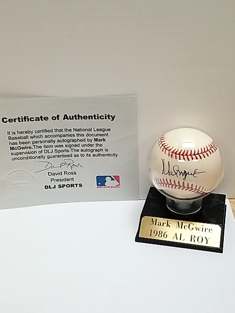 Item #1 — Mark McGwire Signed Baseball with COA photo 1 of 4